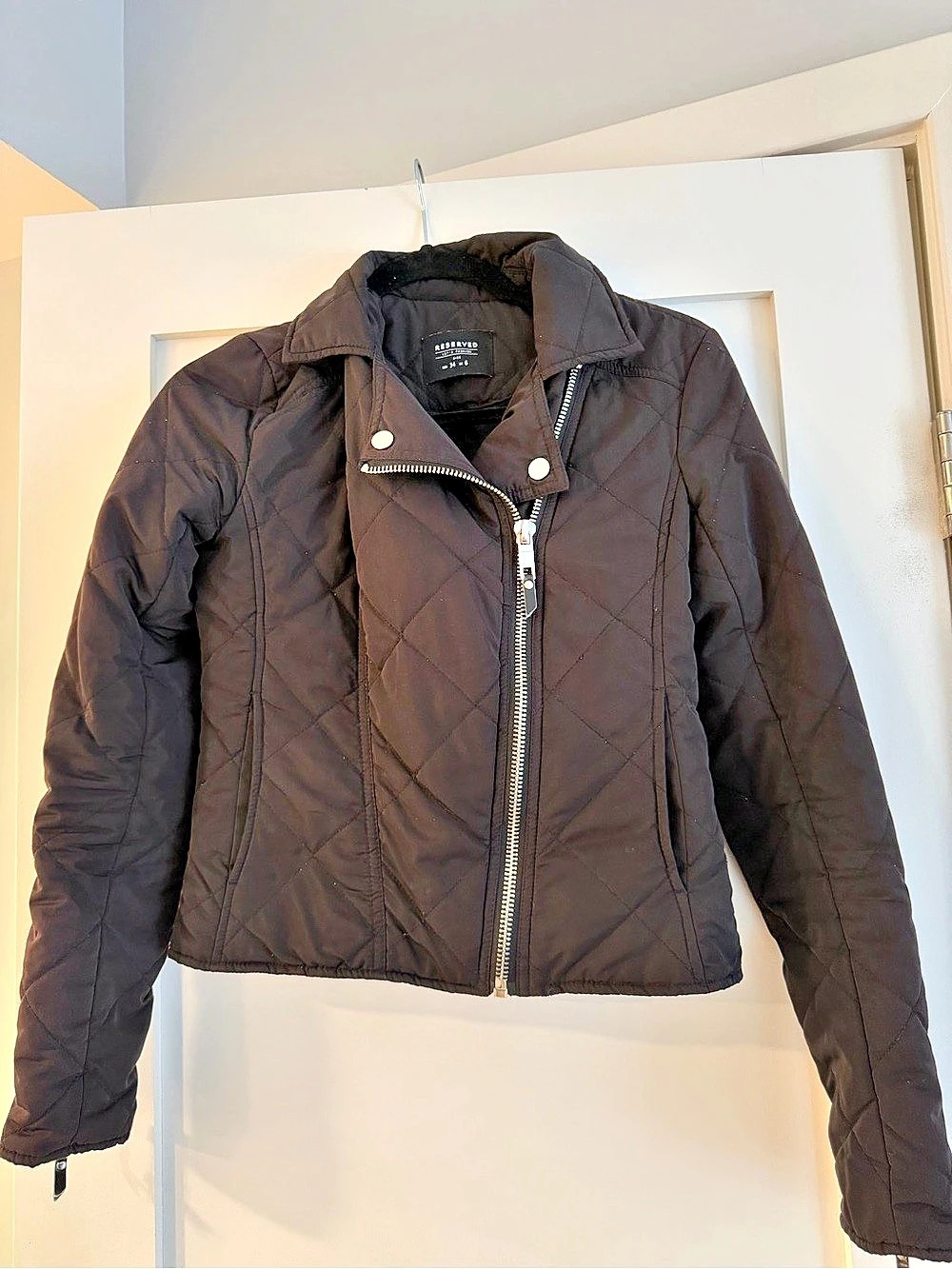 Reserved black quilted moto-style jacket
